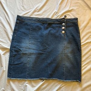 Denim skirt with brocade buttons